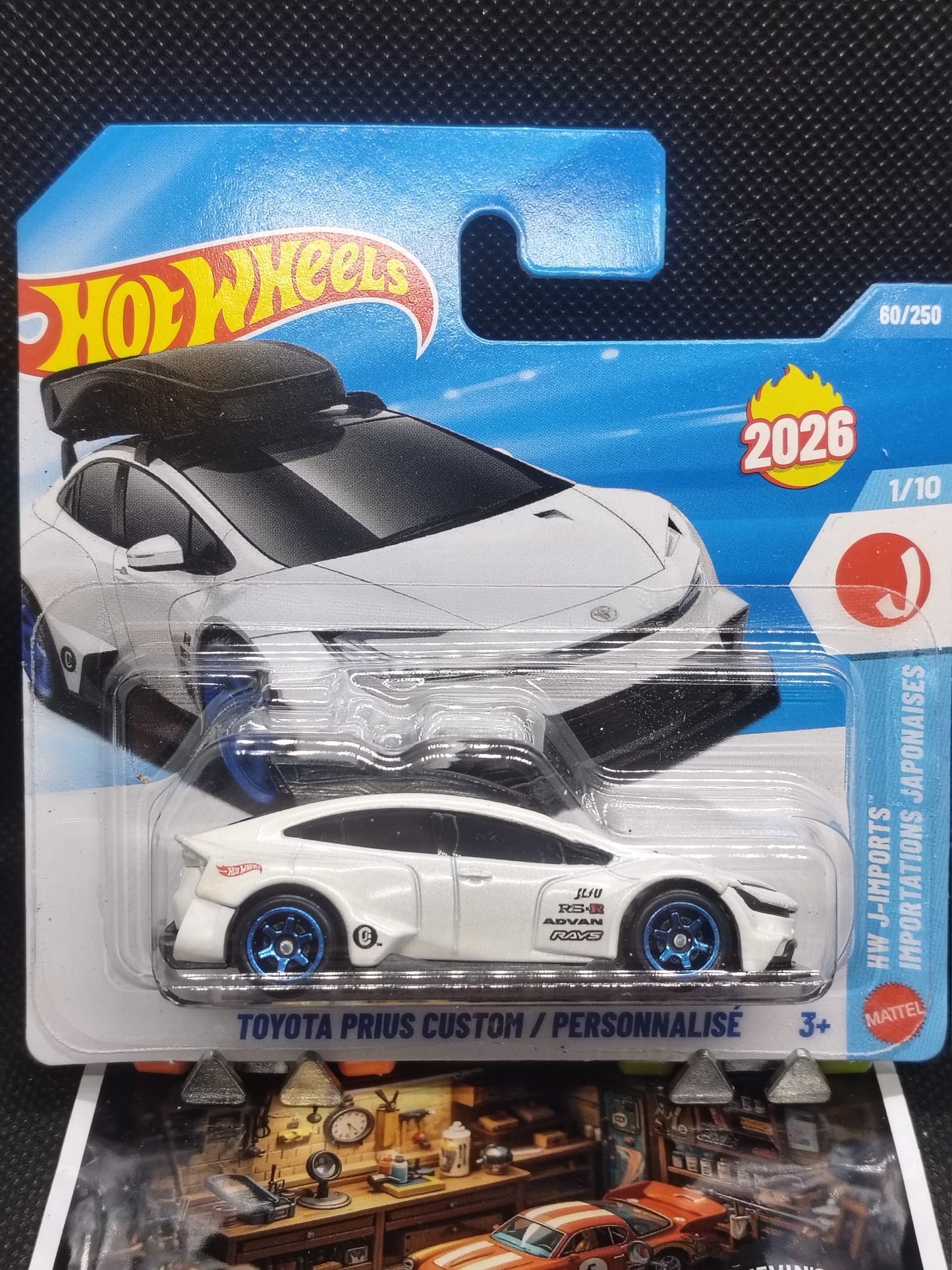 Hot Wheels toy car in packaging with Toyota Prius Custom model